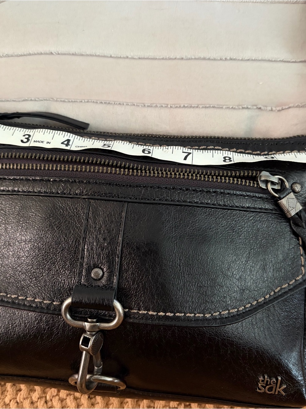 The Sak Black Leather Messenger Crossbody Bag with Silver Hardware